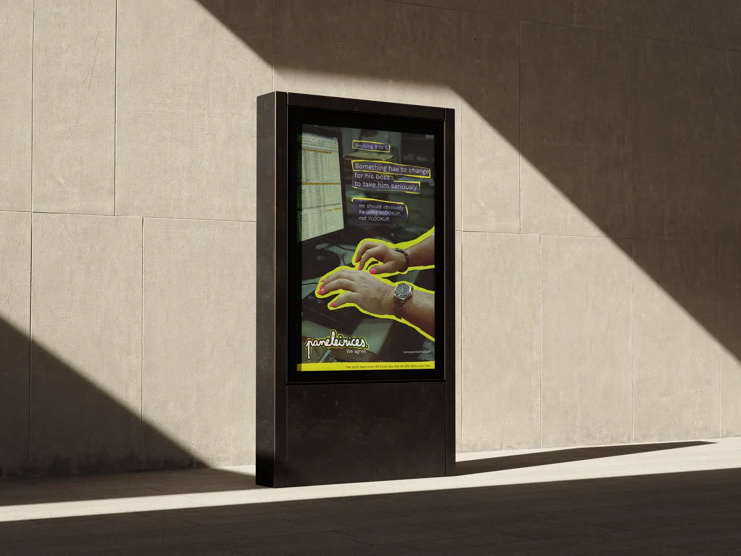 Mupi on a street wall showing the Excel ad