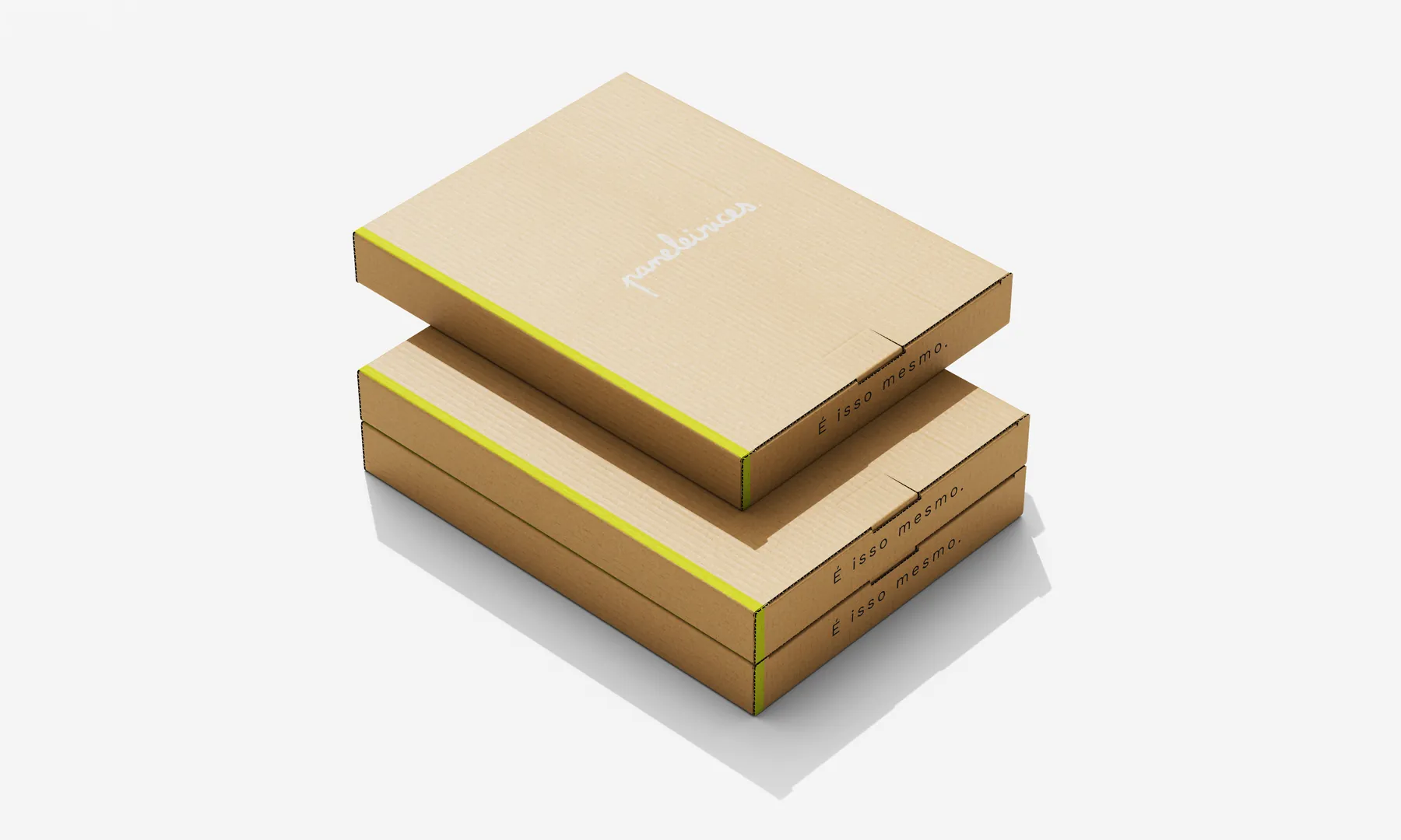 Two stacked kraft shipping boxes with a neon edge