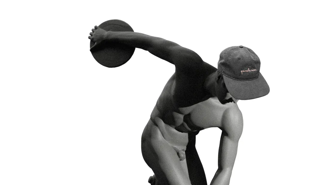 A 3D statue of a discus thrower wearing a Paneleirices cap