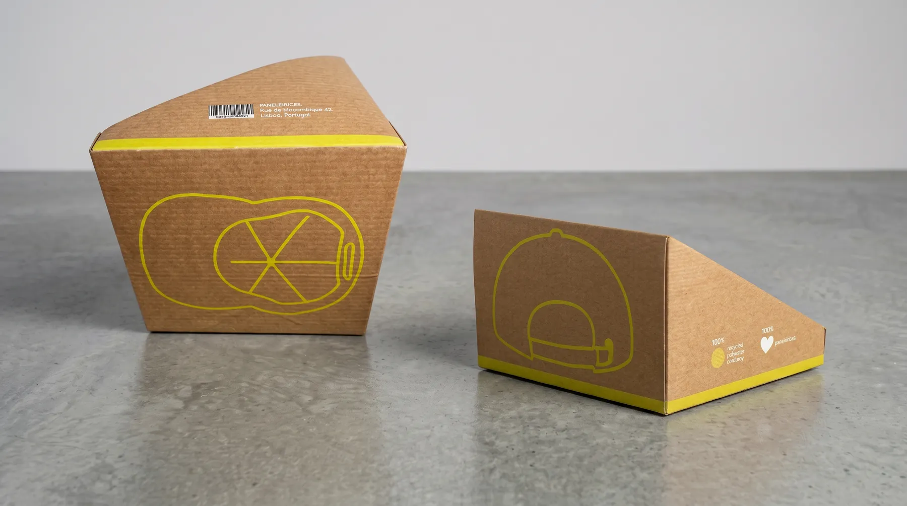 The outer box from the side, in kraft with a neon band