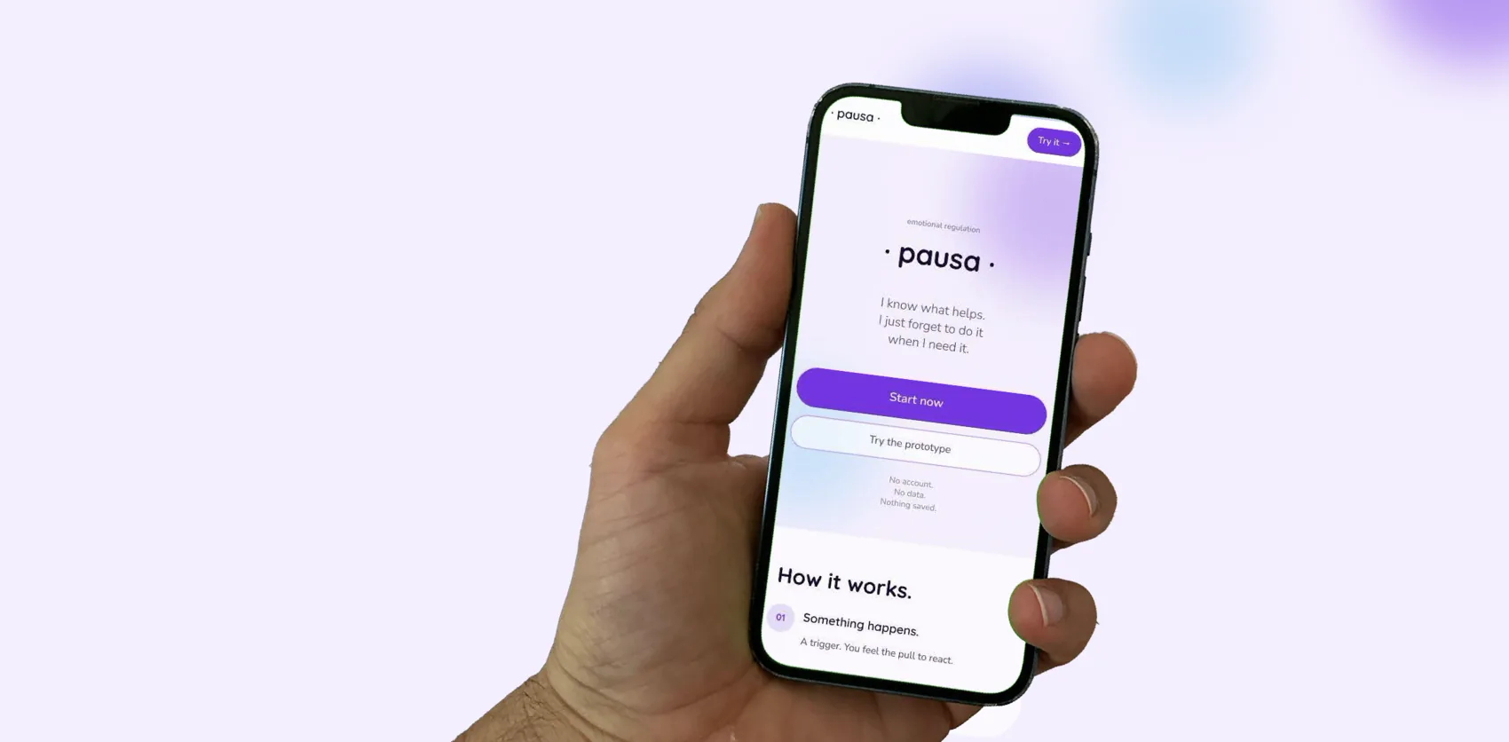 The download page on a phone, held in a hand